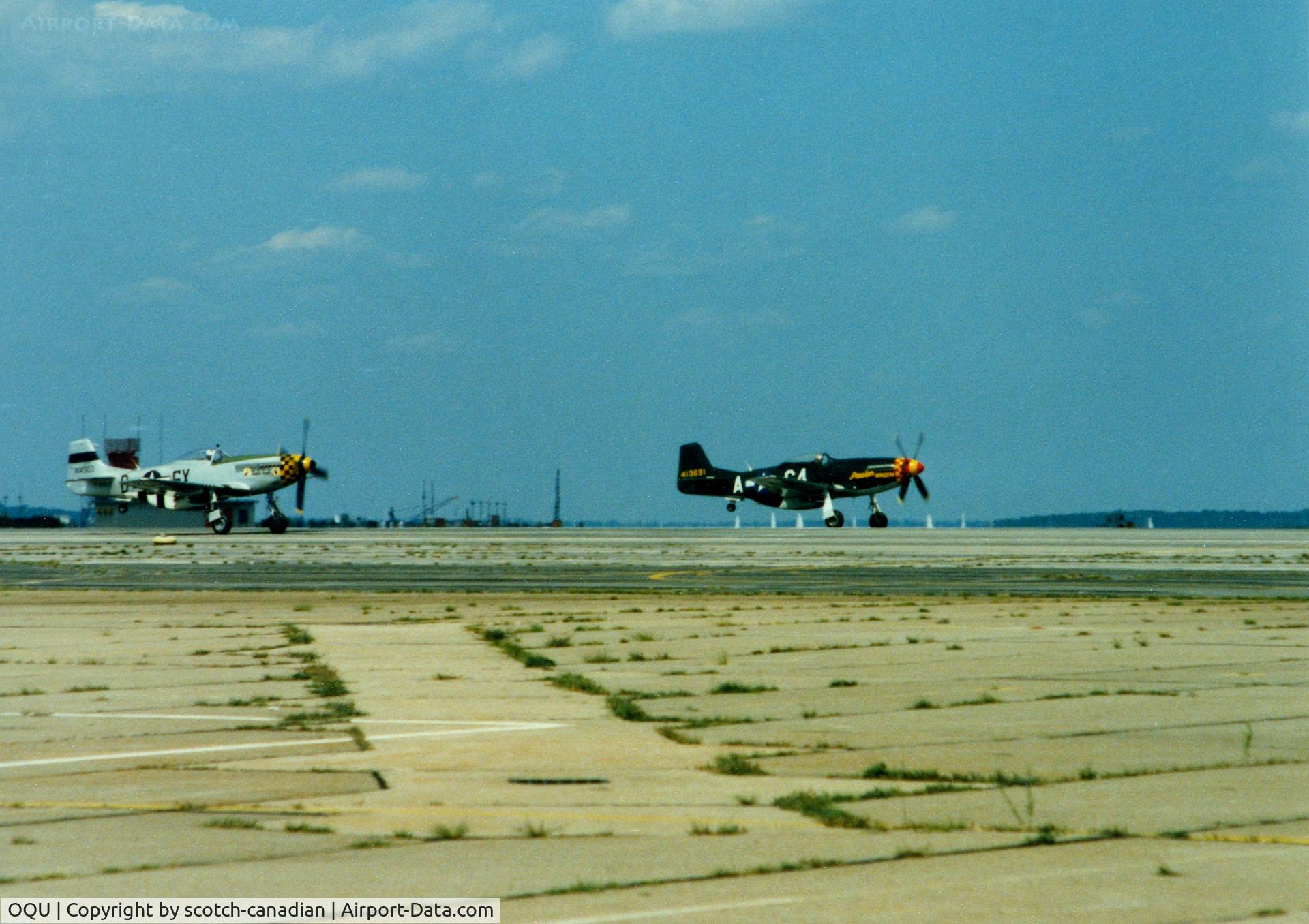 Quonset State Airport (OQU) - 1944 North American P-51D Mustang's N51EA and N51U at Quonset State Airport, North Kingstown, RI - circa 1980's 