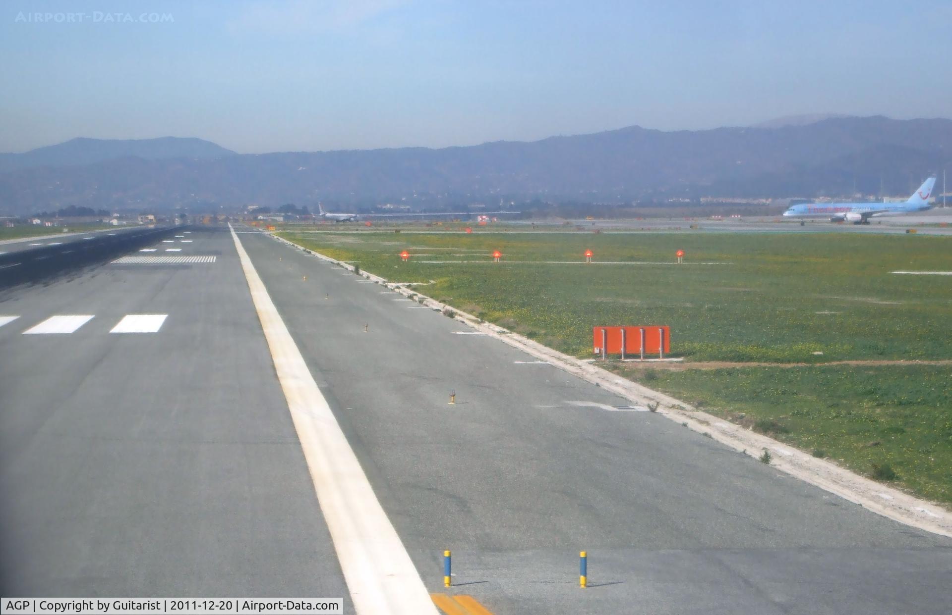 Málaga Airport, Málaga Spain (AGP) - Taxiing to the hold on runway 31 at Malaga