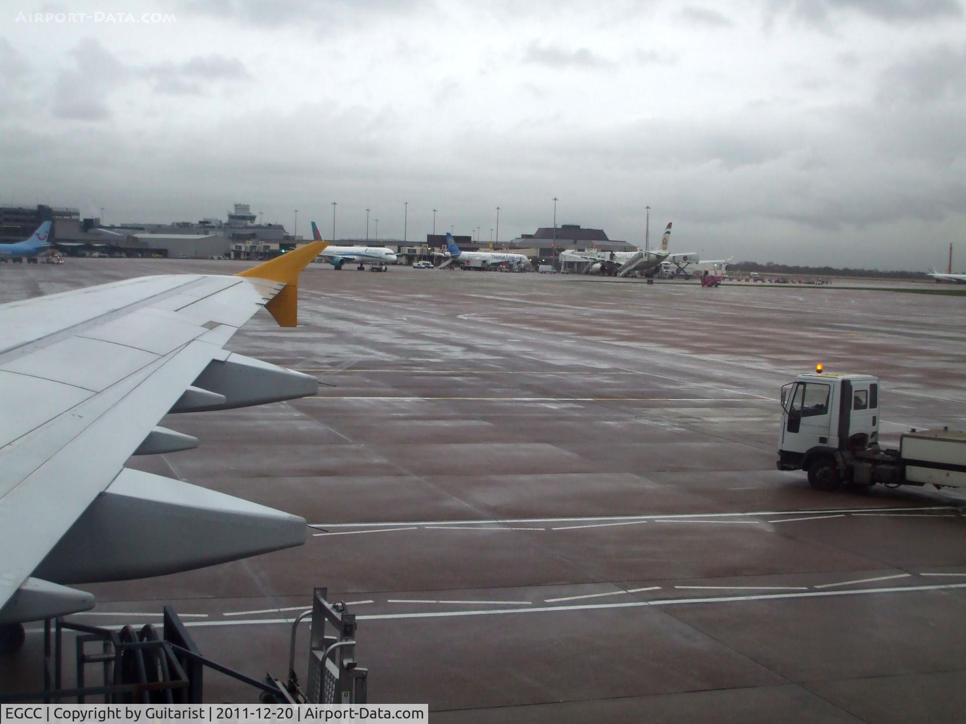 Manchester Airport, Manchester, England United Kingdom (EGCC) - From 20c and sunshine to 5c and rain in 3 hours