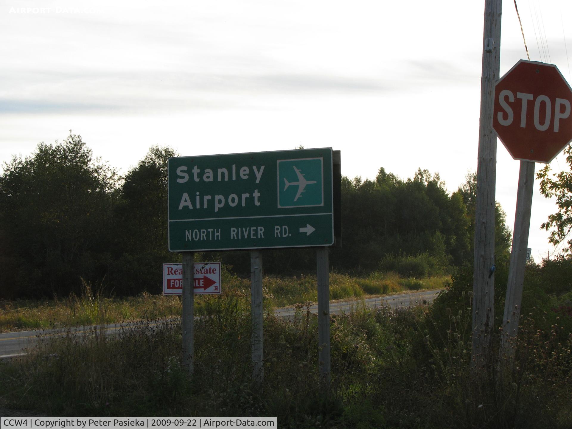 CCW4 Airport - Funny Sign on the road to the Stanley Airport, NS. Sign shows a jumbo aircraft yet the airport boosts longest runway at 2600 feet. 