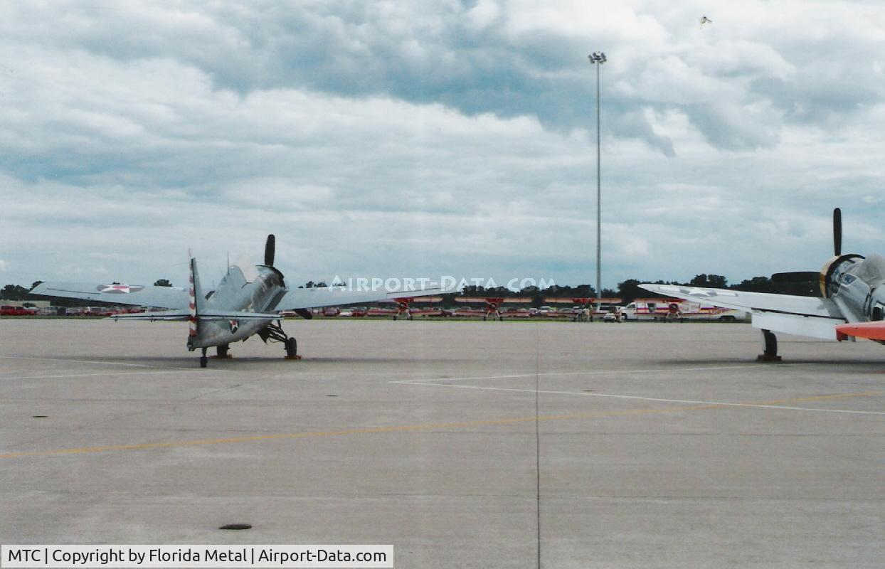 Selfridge Angb Airport (MTC) - Wildcat and part of a P-47 on the warbird ramp at Selfridge