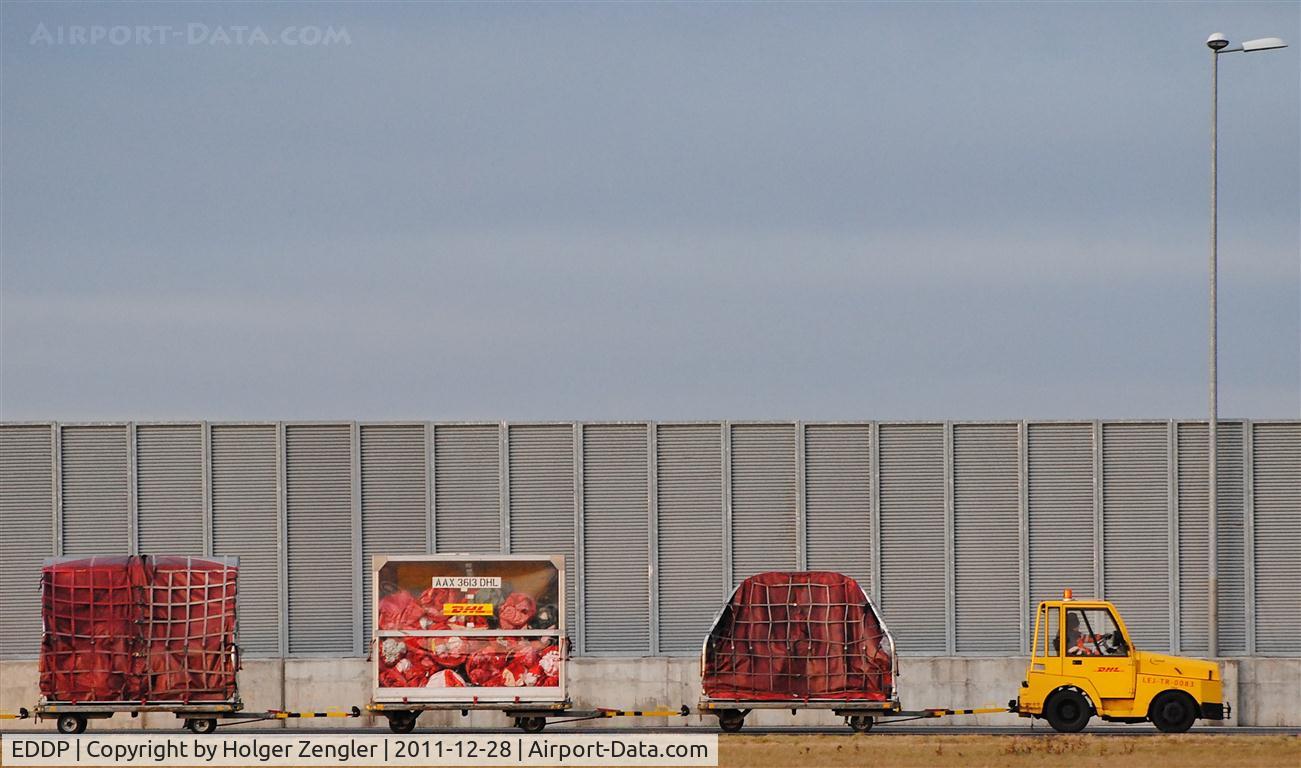Leipzig/Halle Airport, Leipzig/Halle Germany (EDDP) - Some very late x-mas parcels on transfer to a yellow (DHL-) bird...... 