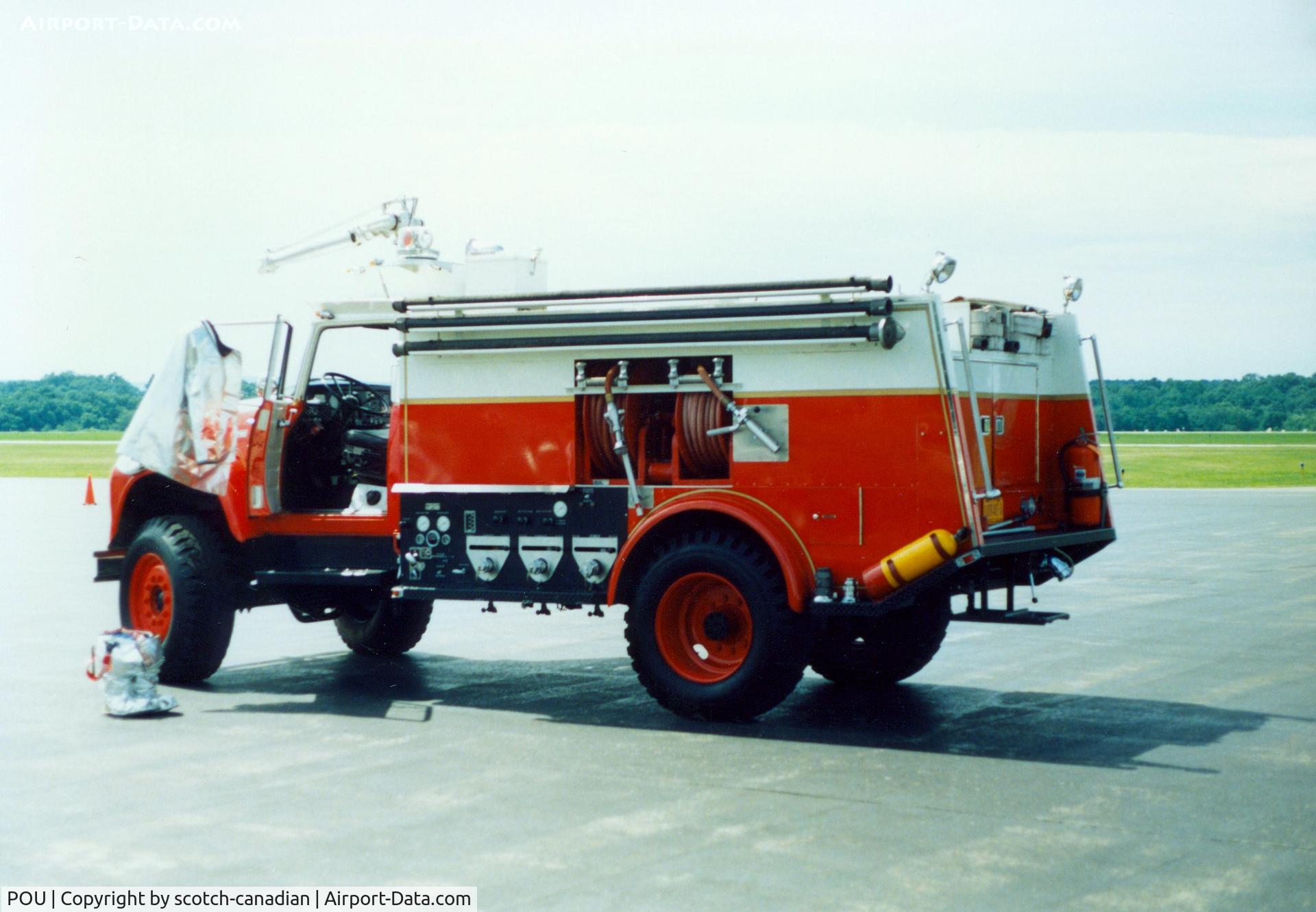 Dutchess County Airport (POU) - Dutchess County Airport Fire Truck at Poughkeepsie, NY - circa 1980's