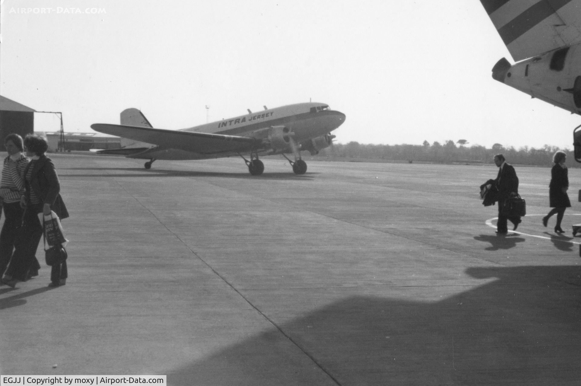 Jersey Airport, Jersey, Channel Islands United Kingdom (EGJJ) - Intra Airways DC3 at Jersey, late 1970's