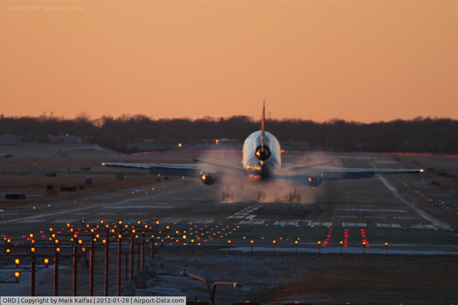 Chicago O'hare International Airport (ORD) - FedEx McDonnell Douglas DC-10-30F, FDX556 arriving RWY 28 KORD.