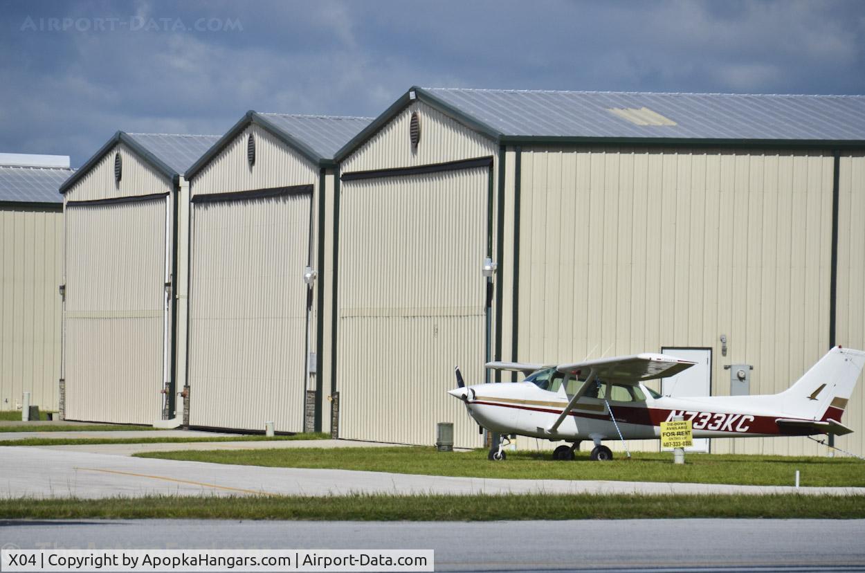 Orlando Apopka Airport (X04) - Hangars and tied-down aircraft at X04