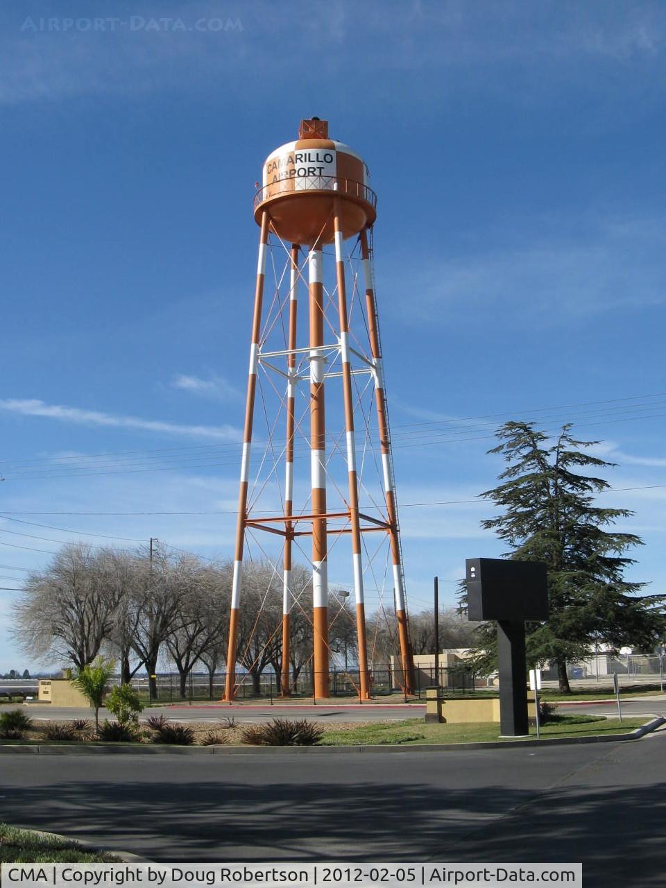 Camarillo Airport (CMA) - CMA's Water Tower and Aviation Rotating Beacon (white-green). Location: SE.