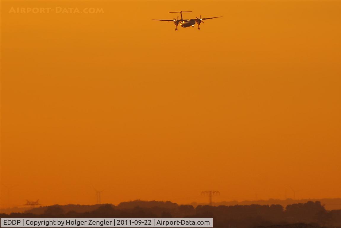 Leipzig/Halle Airport, Leipzig/Halle Germany (EDDP) - A Lufthansa Dash 8 from MUC approaches in beautiful evening light on rwy 08L.