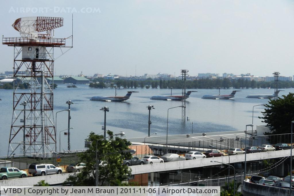 Don Muang International Airport (Old Bangkok International Airport), Bangkok Thailand (VTBD) - Bangkok's old International Airport Don Muang was severely hit by October 2011 floodings. Approx. 20, mostly not airworthy aircrafts were stranded in water for weeks. Cars were mostly saved on elevated highways.