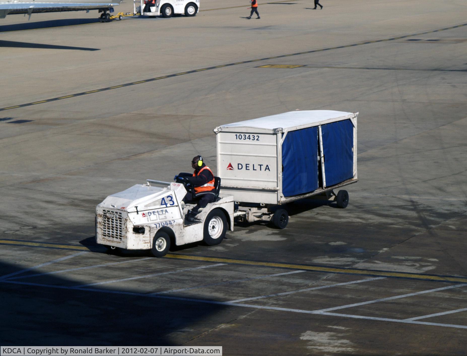 Ronald Reagan Washington National Airport (DCA) - Tug 43 with baggage cart