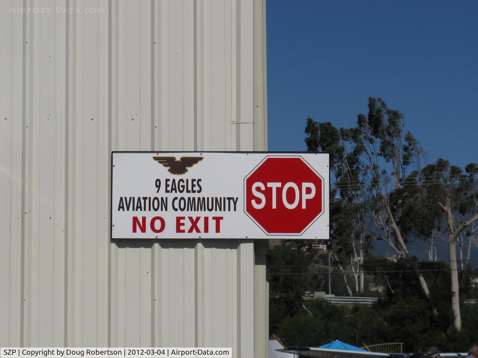 Santa Paula Airport (SZP) - 9 Eagles Aviation Community hangars. Entry warning of cul-de-sac