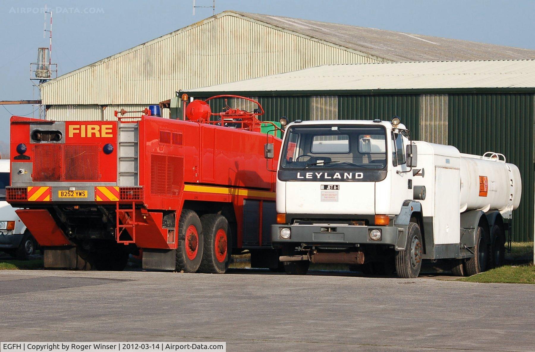 Swansea Airport, Swansea, Wales United Kingdom (EGFH) - Scammel Fire and Rescue tender FIRE 1 and recently arrived Leyland Jet A-1 fuel tanker.