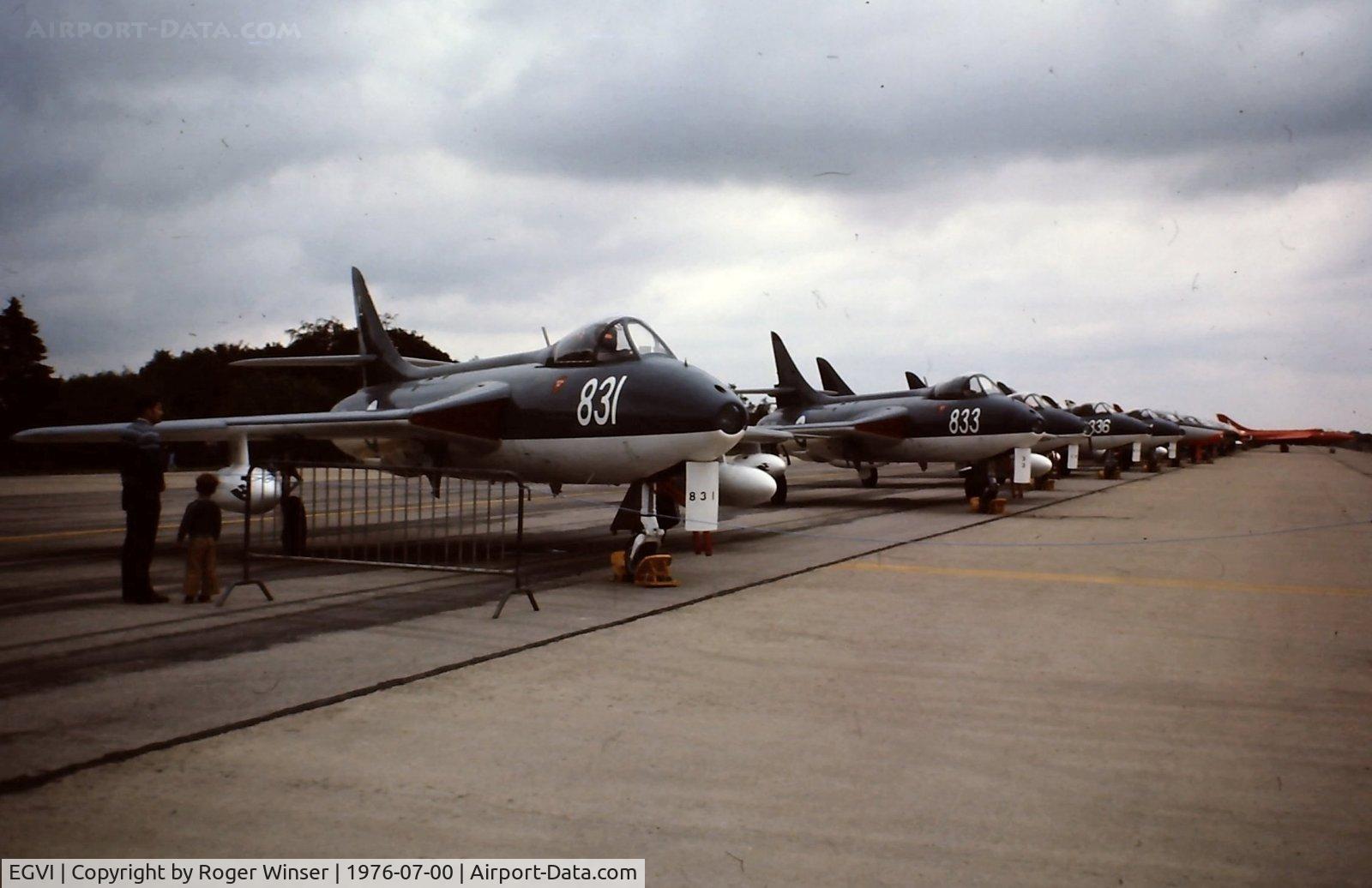 EGVI Airport - Line up of Royal Navy Hawker Hunters at IAT 76 held at RAF Greenham Common in July 1976. Celebrating  25 years since the first flight of the Hunter on 20 July 1951