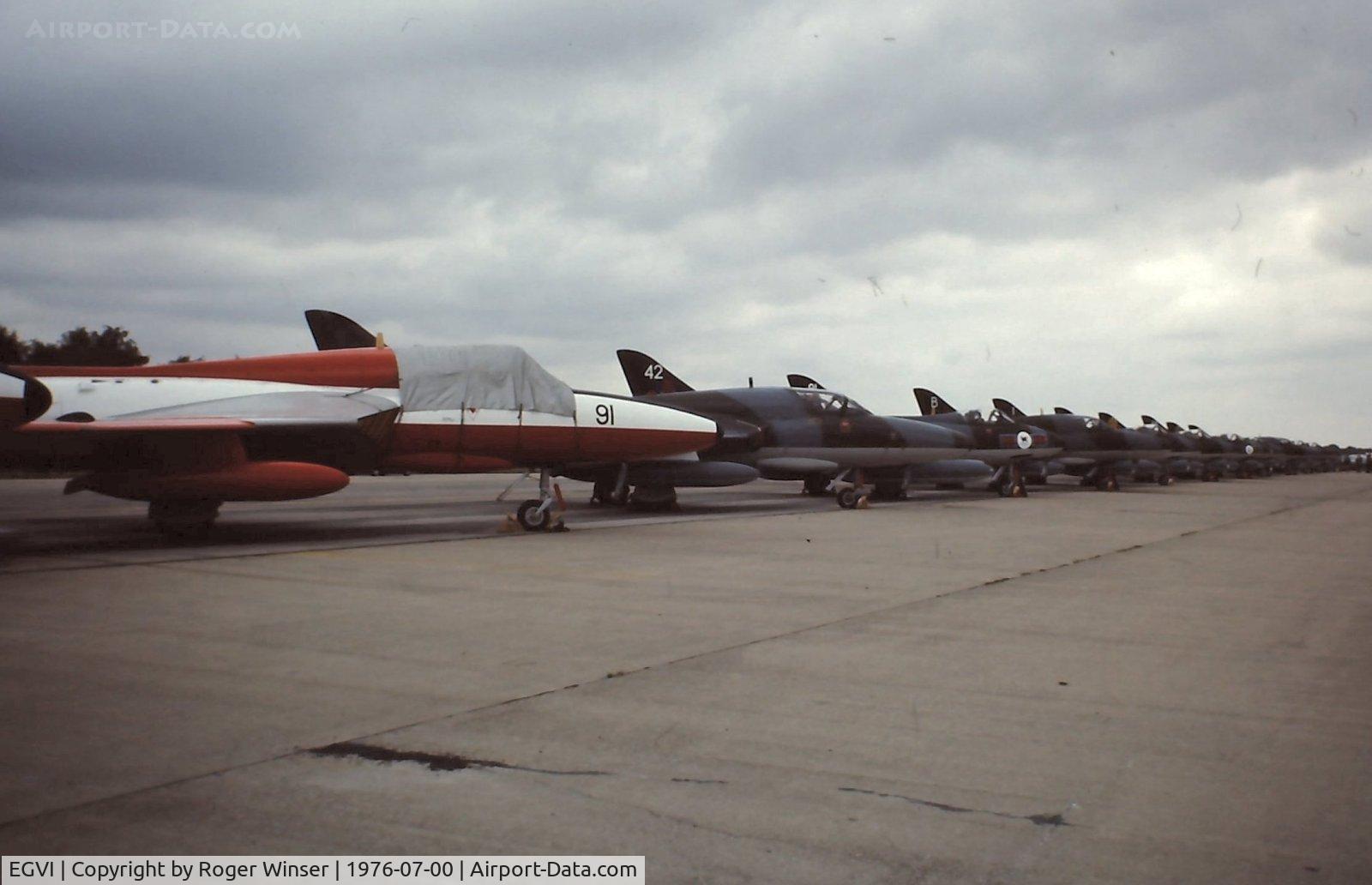 EGVI Airport - Line up of 2 seat Hawker Hunters at IAT 76 held at RAF Greenham Common in July 1976. Celebrating the 25 years since the first flight of the Hunter on 20 July 1951. 