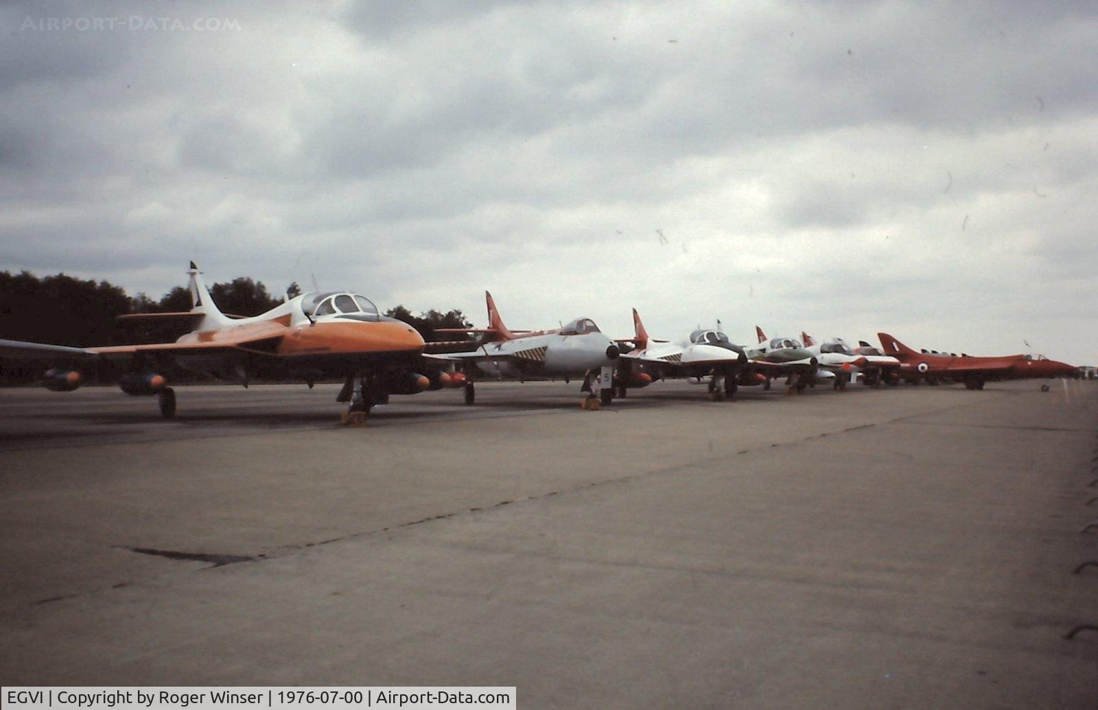 EGVI Airport - Line up of Hawker Hunters (including the prototype)
at IAT 76 held at RAF Greenham Common in July 1976. Celebrating 25 years since the first flight of the prototype on 20 July 1951.