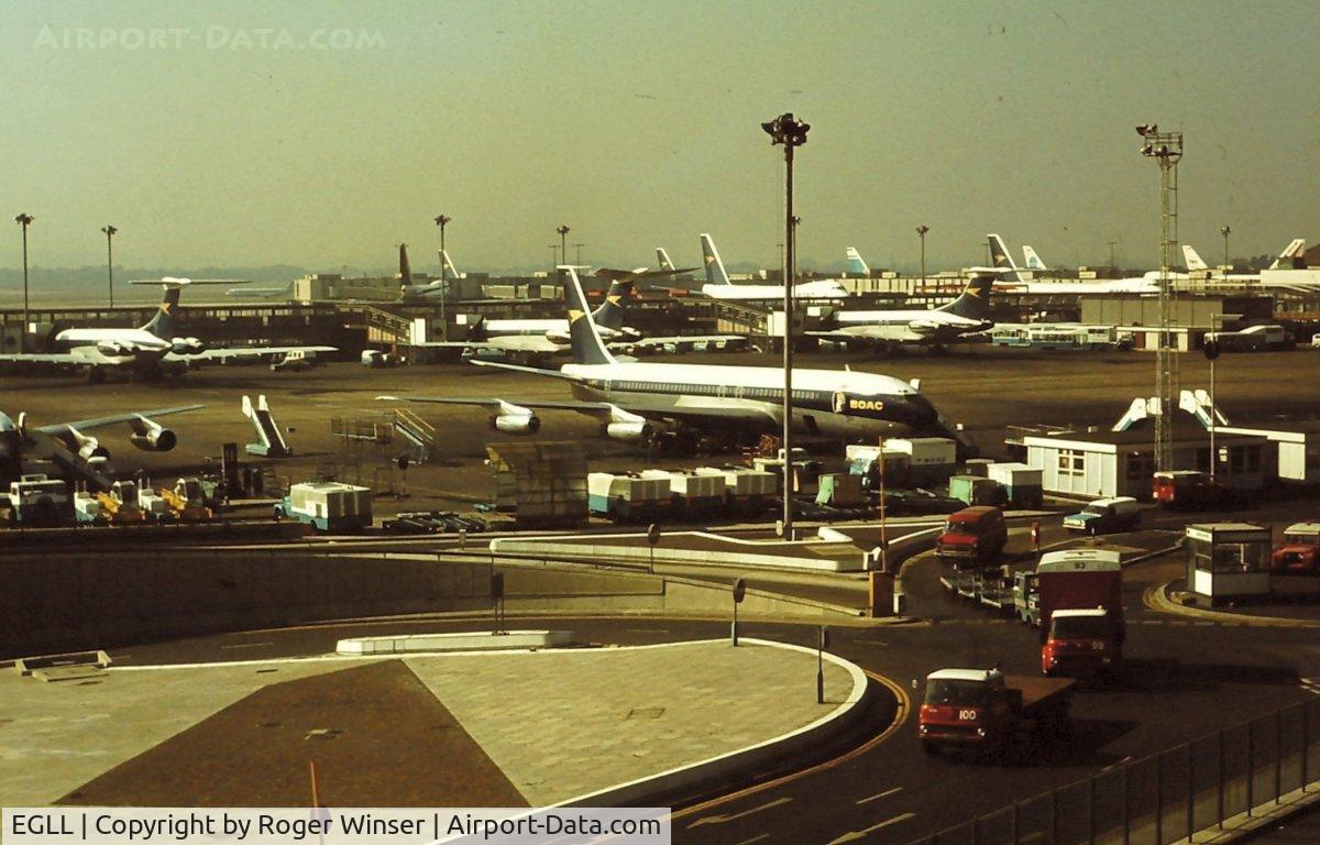 London Heathrow Airport, London, England United Kingdom (EGLL) - View over the BOAC apron in the early 1970's showing Speedbird 707's, 747's and VC 10's.