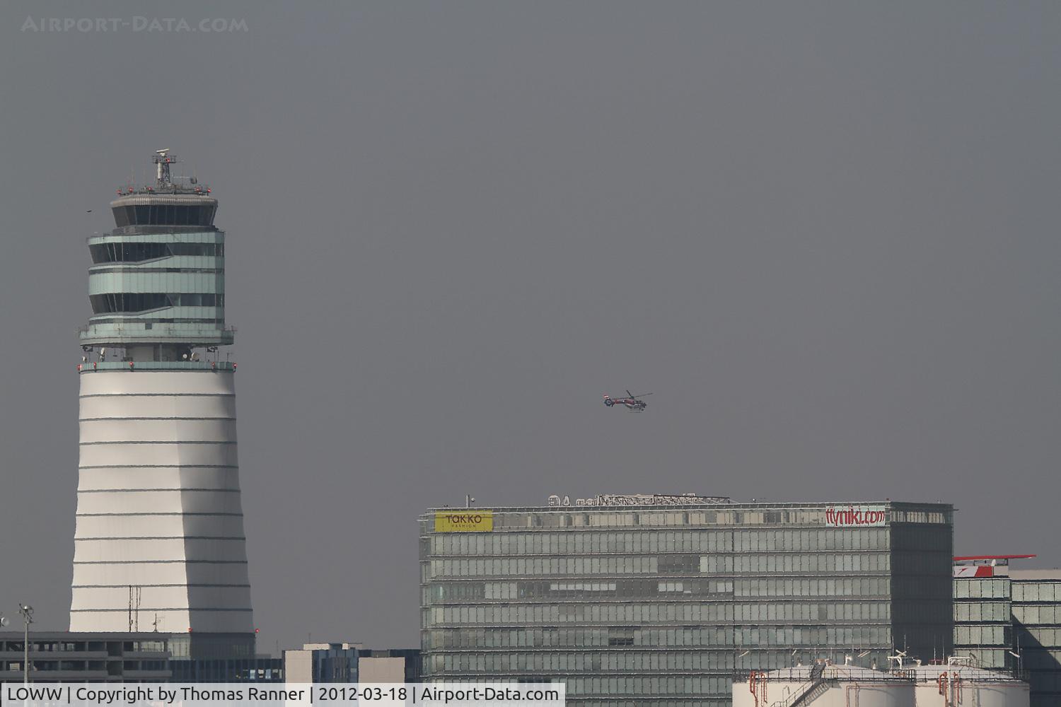Vienna International Airport, Vienna Austria (LOWW) - Vie Tower and a helicopter of the Police.