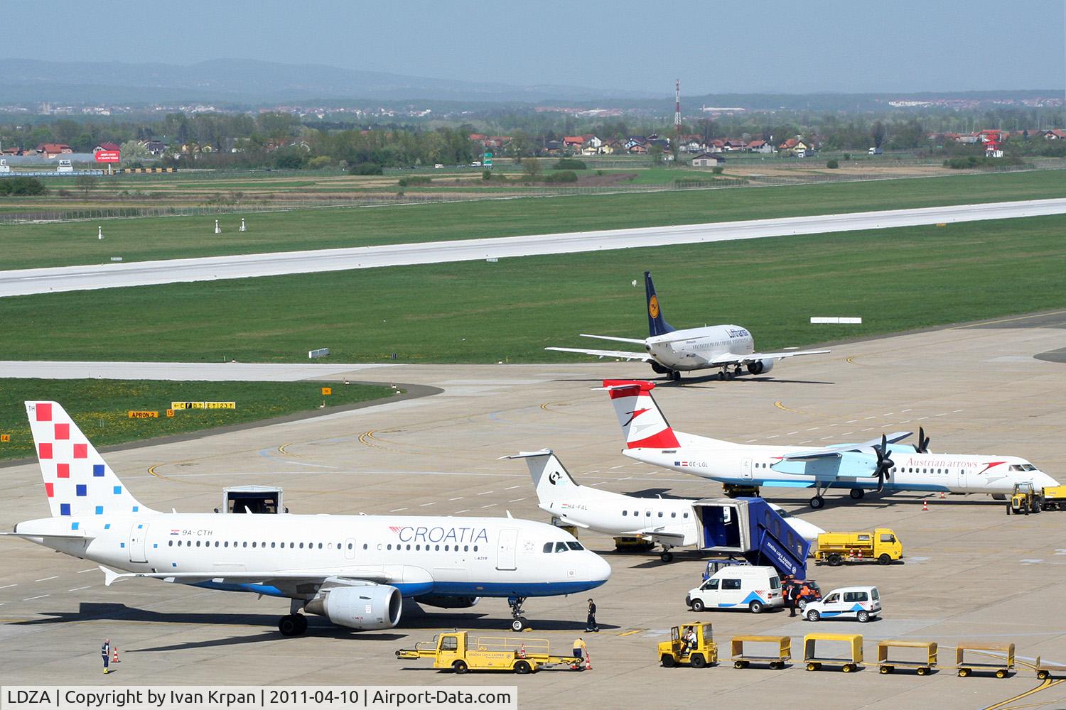 Zagreb Pleso Airport, Zagreb Croatia (LDZA) - Picture shows east side of Zagreb airport platform. Left from DLH Boeing 737 is taxiway C and DLH taxi on taxiway F to the holding point runway 23.