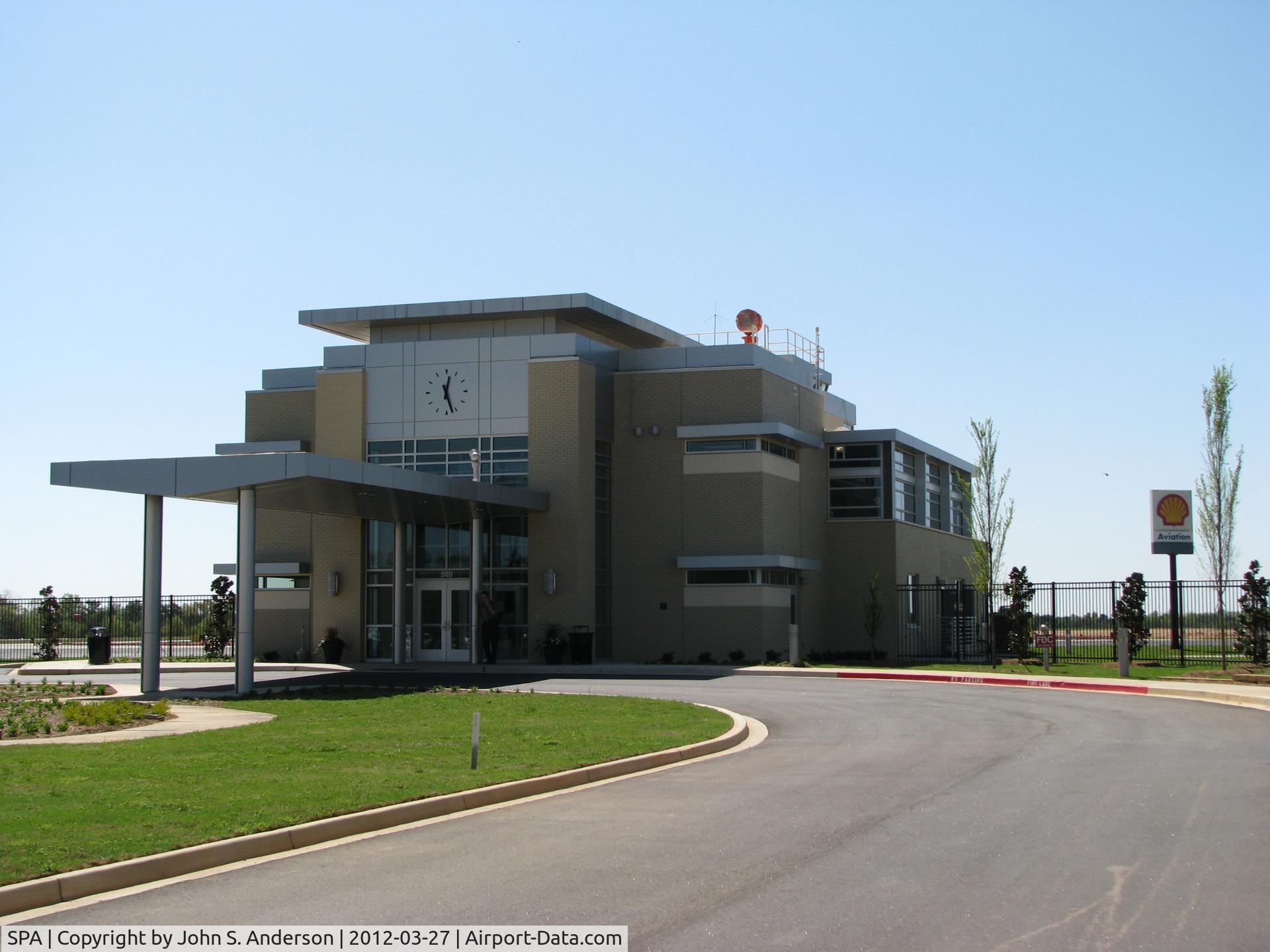 Spartanburg Downtown Memorial Airport (SPA) - Terminal with free parking to the left.