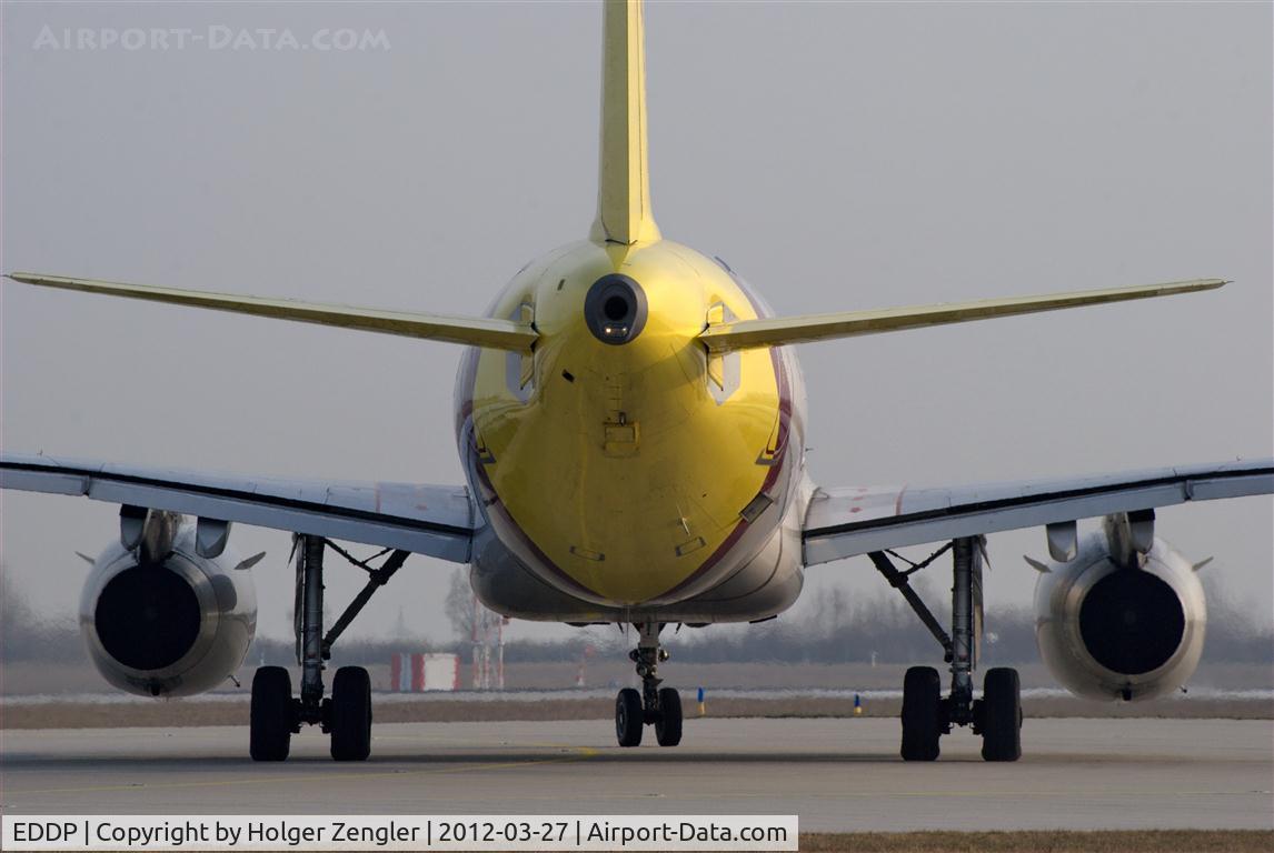 Leipzig/Halle Airport, Leipzig/Halle Germany (EDDP) - After the planes turn into taxiway A7 you can check tire pressure. Seems like this A 319 has a little of it on right side tires....