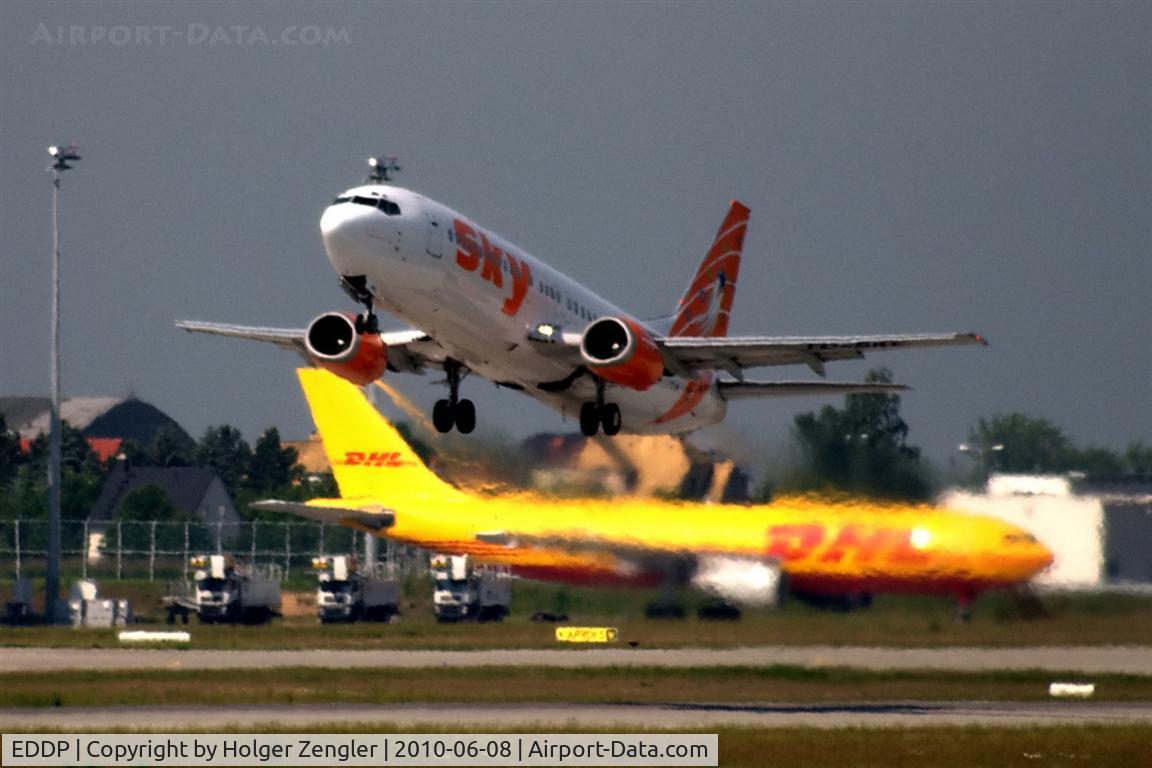 Leipzig/Halle Airport, Leipzig/Halle Germany (EDDP) - One of those rather rare take-offs of civil aviation on rwy 08R.....