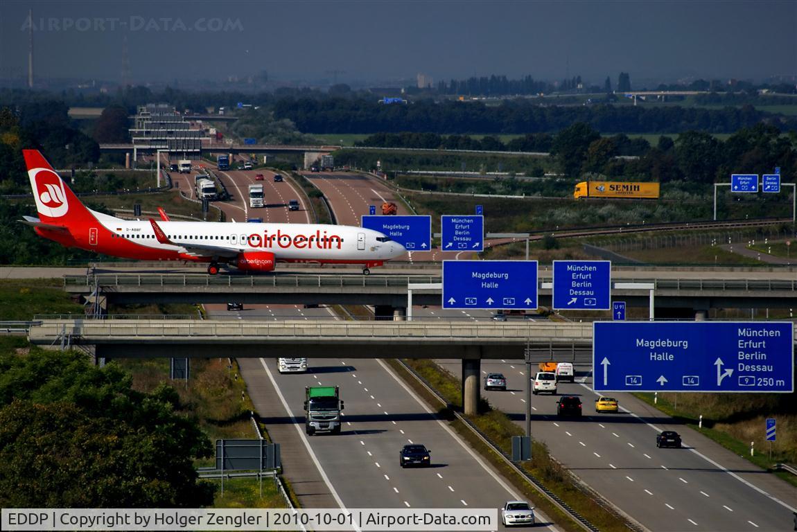 Leipzig/Halle Airport, Leipzig/Halle Germany (EDDP) - Traffic on W1 (first floor) and A14 (basement) photographed from parkade (fifth floor).