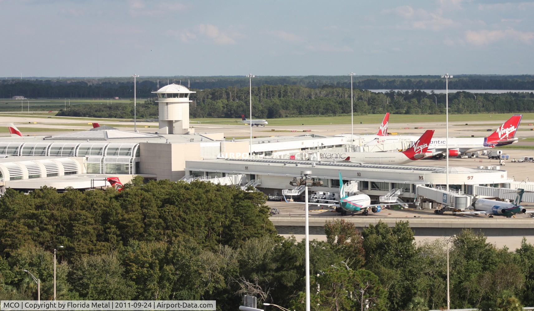 Orlando International Airport (MCO) - Airside 4 at MCO - There are 4 Virgin Atlantic and 1 British Airways plane parked around the 80s wing gates