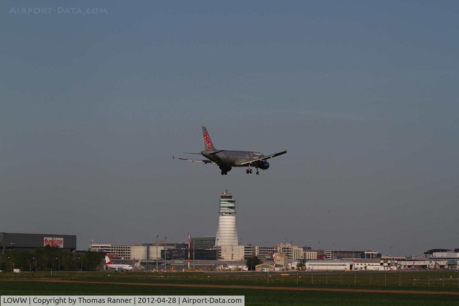 Vienna International Airport, Vienna Austria (LOWW) - Niki Airbus A320 with the ex Austrian Boeing 737 OE-LNL in the background.