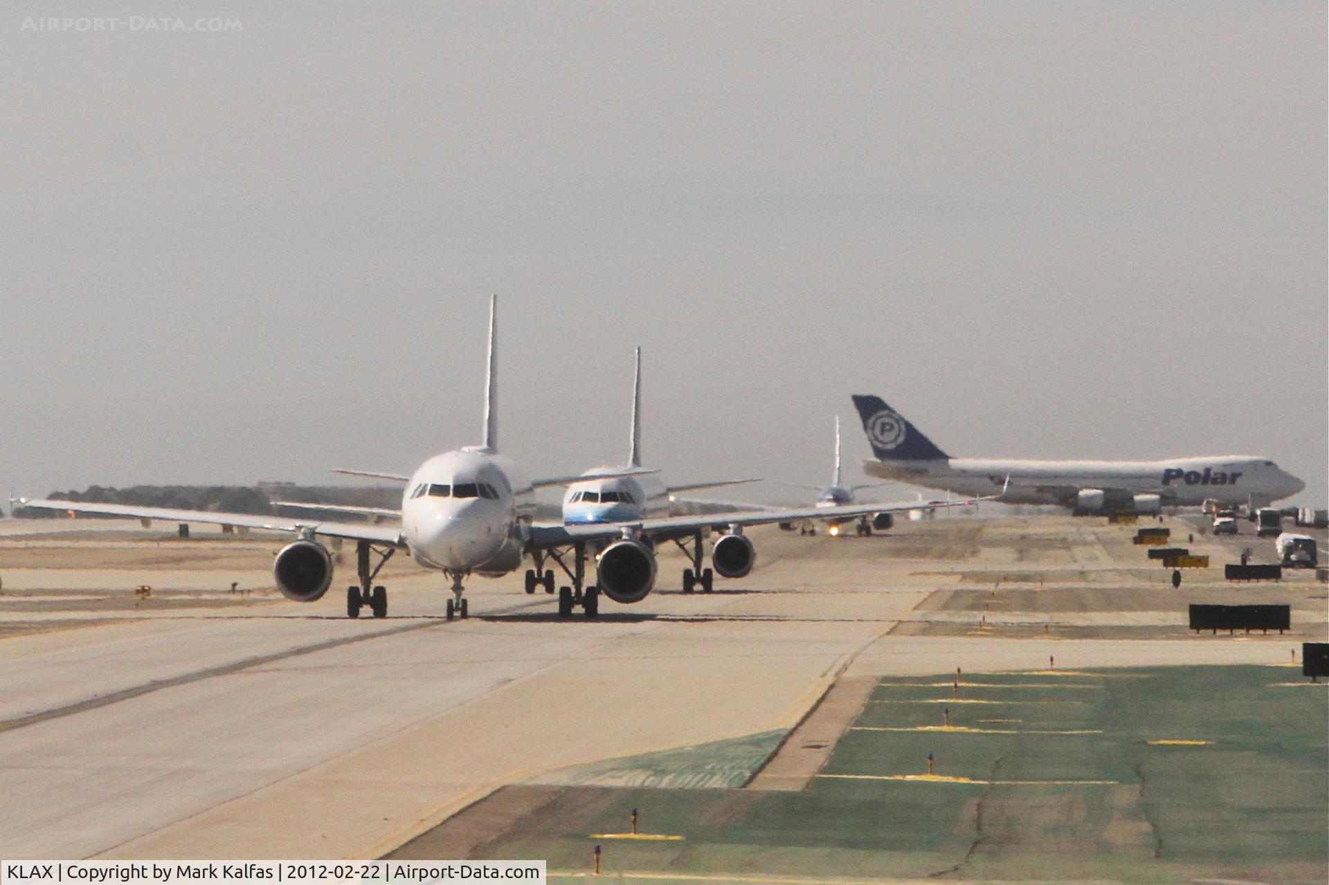 Los Angeles International Airport (LAX) - Looking west down TWY B from C1 at Los Angeles International Airport.