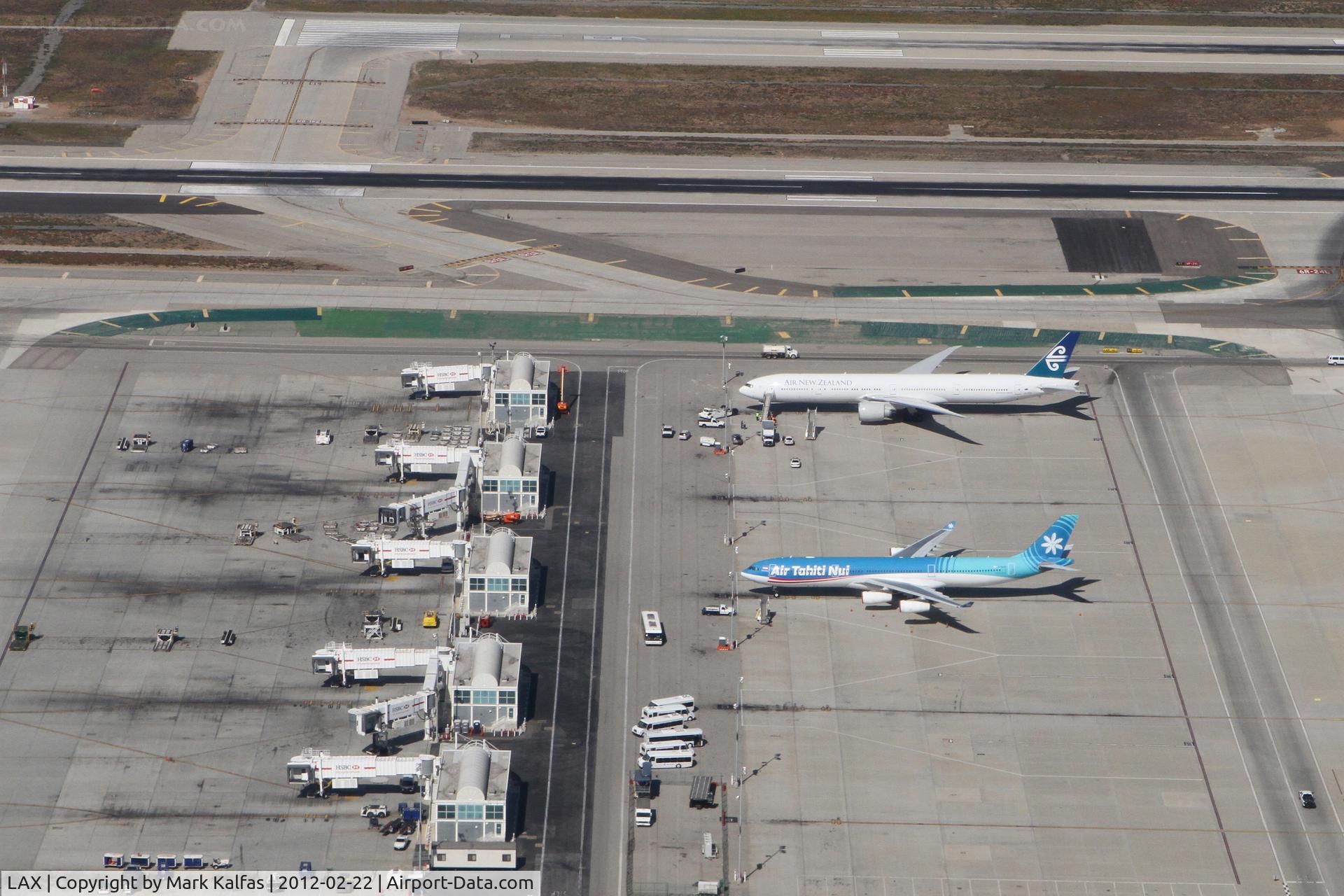 Los Angeles International Airport (LAX) - Air Tahiti Nui A343 and Air New Zealand B773 at West/Remote Gates.
