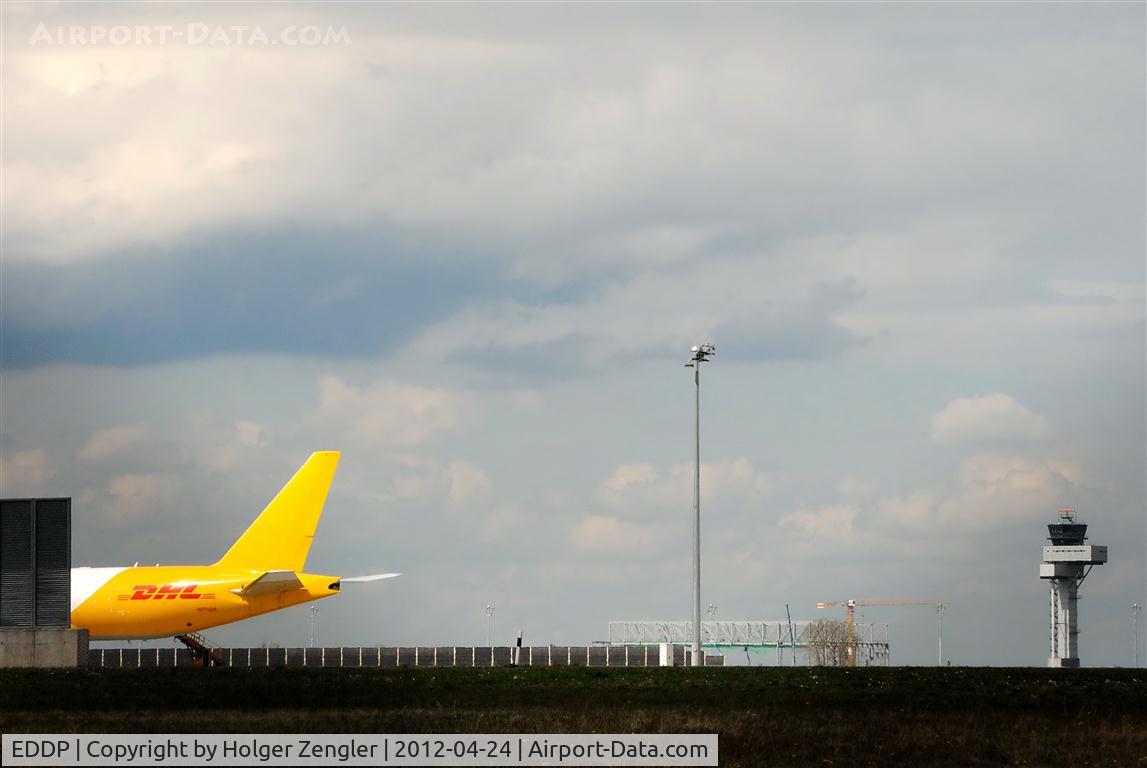 Leipzig/Halle Airport, Leipzig/Halle Germany (EDDP) - View over DHL apron to Leipzig tower and building construction of a new AN 124 hangar......