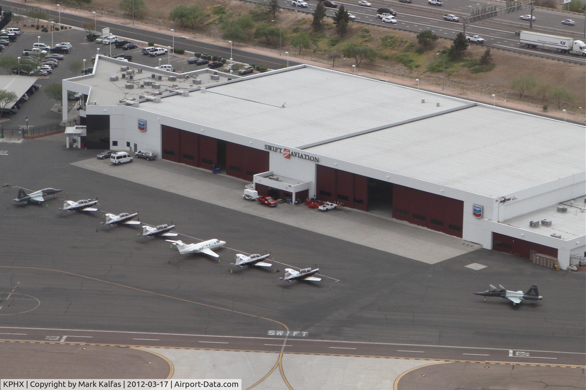 Phoenix Sky Harbor International Airport (PHX) - Phoenix, Arizona - Swift Aviation Ramp at Sky Harbor International Airport, as seen on departure from RWY 25R.
