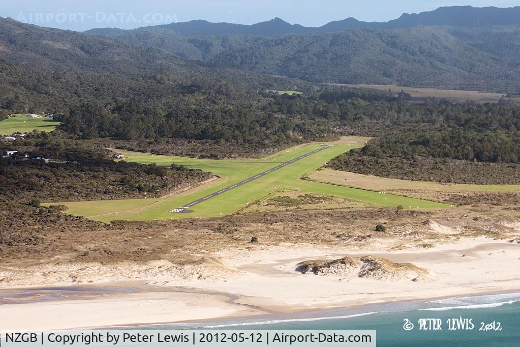 Great Barrier Aerodrome Airport, Great Barrier Island New Zealand (NZGB) - Turning from base leg to final, RW28