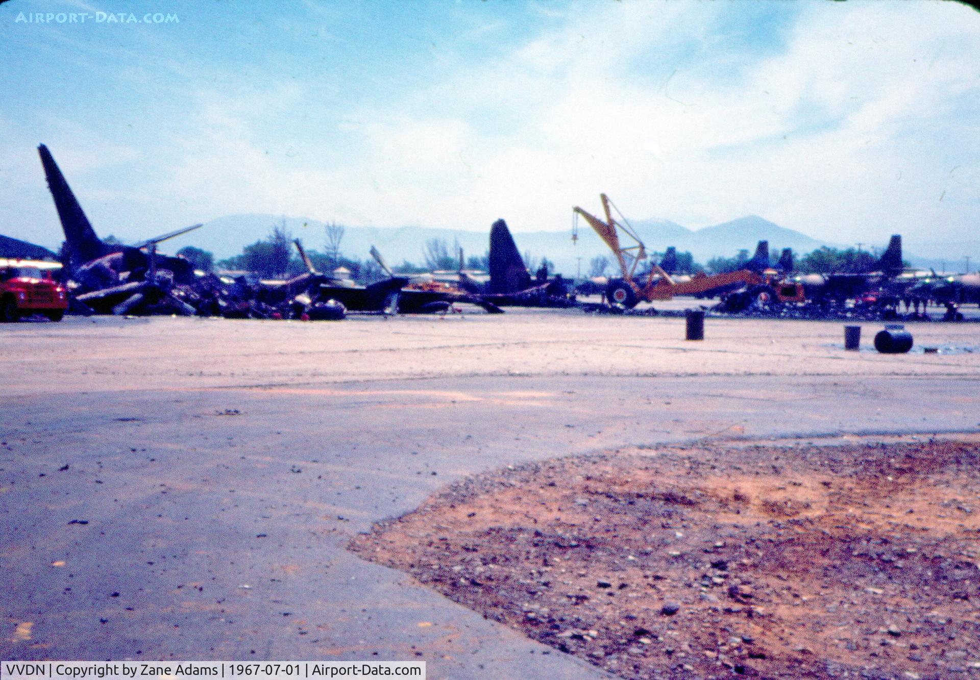 Da Nang International Airport, Da Nang Viet Nam (VVDN) - Photographed at what looks to be Da Nang Air Base - Aftermath of a rocket attack on the base @ 1967 - scanned from a 35mm slide bought at an estate sale