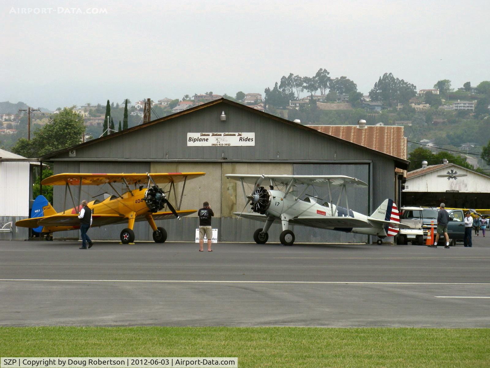 Santa Paula Airport (SZP) - N1942 1942 Boeing Stearman A75N1 as Navy N2S-3, 220 Hp and N56245 1942 Boeing Stearman A75N1 as PT-17, 275 Hp upgrade on display, Biplane Rides offered 