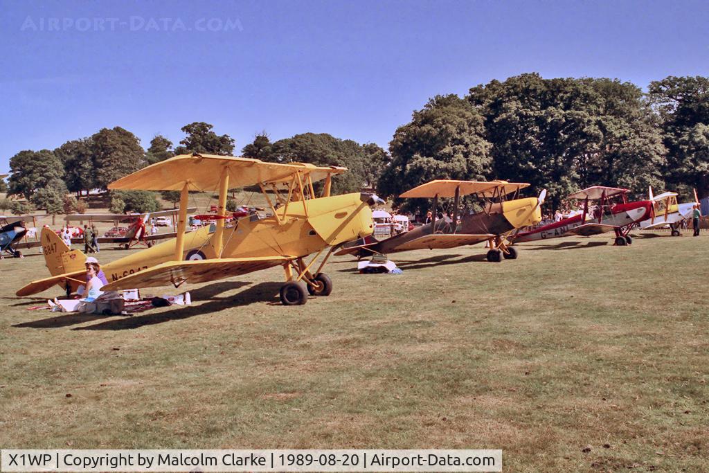 X1WP Airport - Without doubt one of the most scenic of UK annual air days, this the 1989 De Havilland Moth Rally held in the park lands of Woburn Abbey in Bedfordshire.