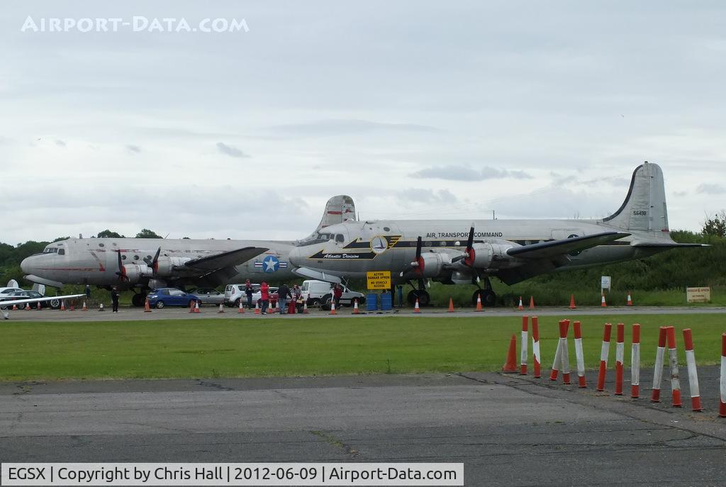 North Weald Airfield Airport, North Weald, England United Kingdom (EGSX) - N31356 Douglas DC-4 and N44914 Douglas C54B which have both been stored at North Weald for ten years