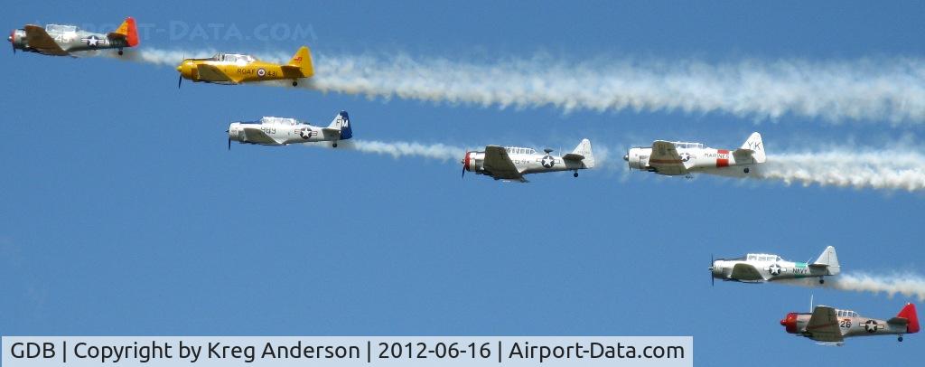 Granite Falls Muni/lenzen-roe Memorial Fld Airport (GDB) - A flyover of 7 T-6's and SNJ's at the 2012 Ray Fagen Memorial Airshow.