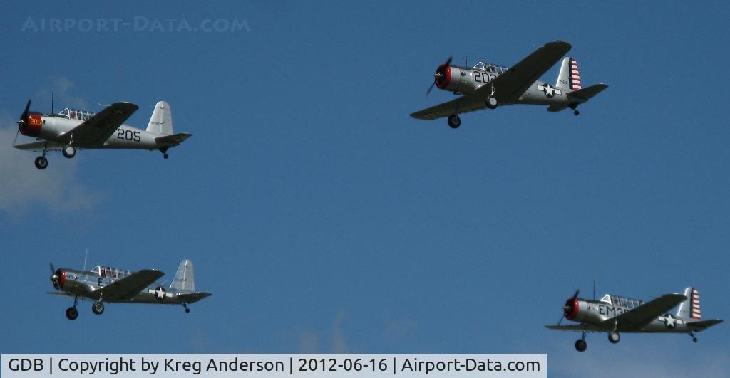 Granite Falls Muni/lenzen-roe Memorial Fld Airport (GDB) - 4 Vultee BT-13 Valiants doing a flyover at the 2012 Ray Fagen Memorial Airshow.