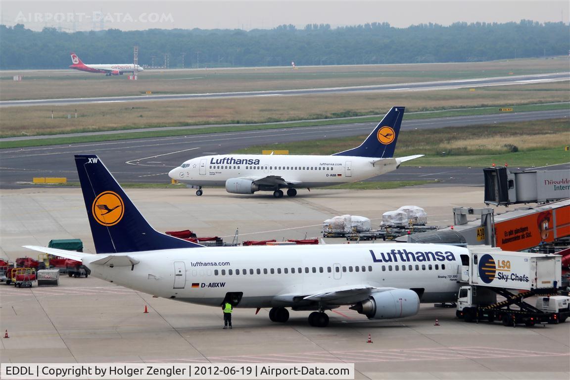 Düsseldorf International Airport, Düsseldorf Germany (EDDL) - Preparations at gate 10, lining up for rwy 05R and an arrival on rwy 05L on one pic.