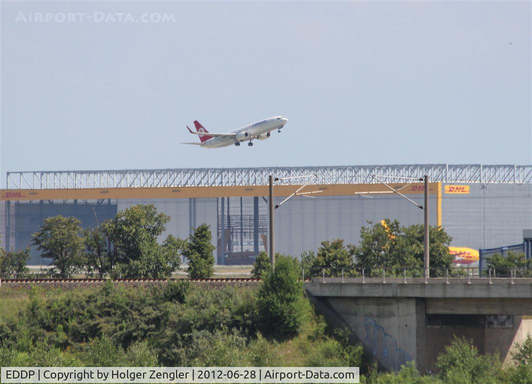 Leipzig/Halle Airport, Leipzig/Halle Germany (EDDP) - View to DHL hangar and outbound traffic on rwy 26L....