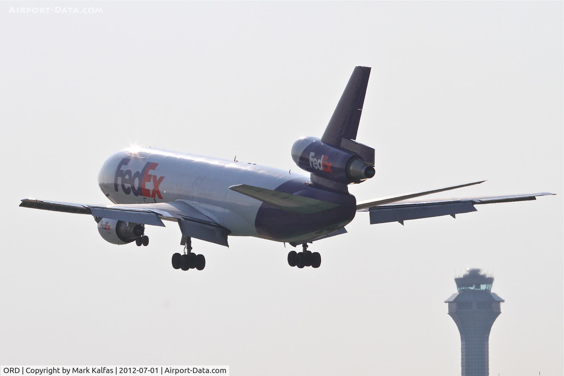 Chicago O'hare International Airport (ORD) - FedEx Mcdonnell Douglas MD-10-10F, FDX398 arriving from Memphis on RWY 28 at O'Hare International.