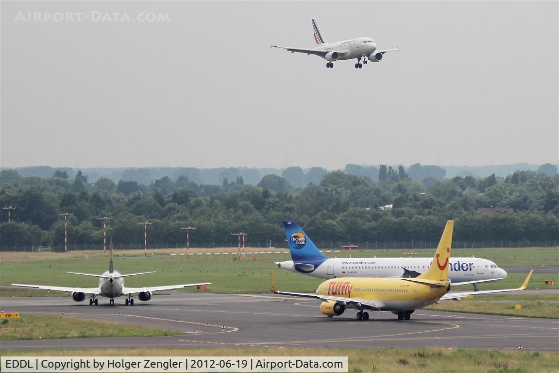 Düsseldorf International Airport, Düsseldorf Germany (EDDL) - Runway 05R - center of afternoon rush our.....