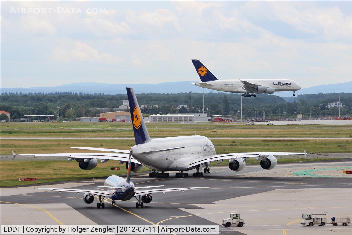 Frankfurt International Airport, Frankfurt am Main Germany (EDDF) - Inbound traffic on rwy 25L observed by outbound traffic at holding point 25C......