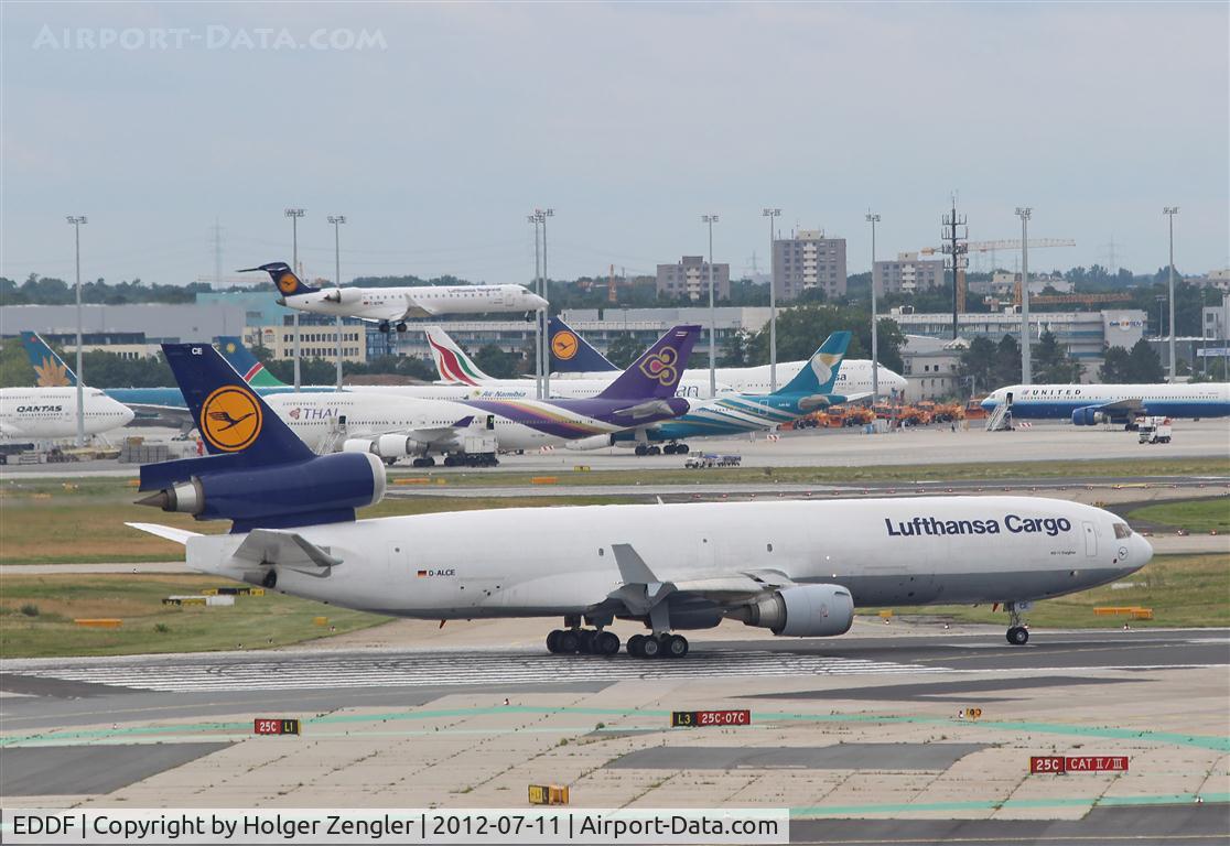 Frankfurt International Airport, Frankfurt am Main Germany (EDDF) - A huge outbounder on rwy 25C is waiting for a tiny inbounder on rwy 25L......