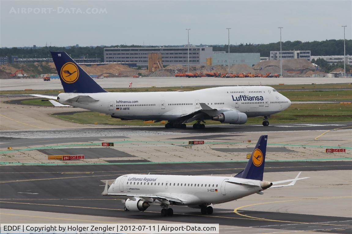 Frankfurt International Airport, Frankfurt am Main Germany (EDDF) - Some feet and 19 years on duty are between those two at rwy 25C....