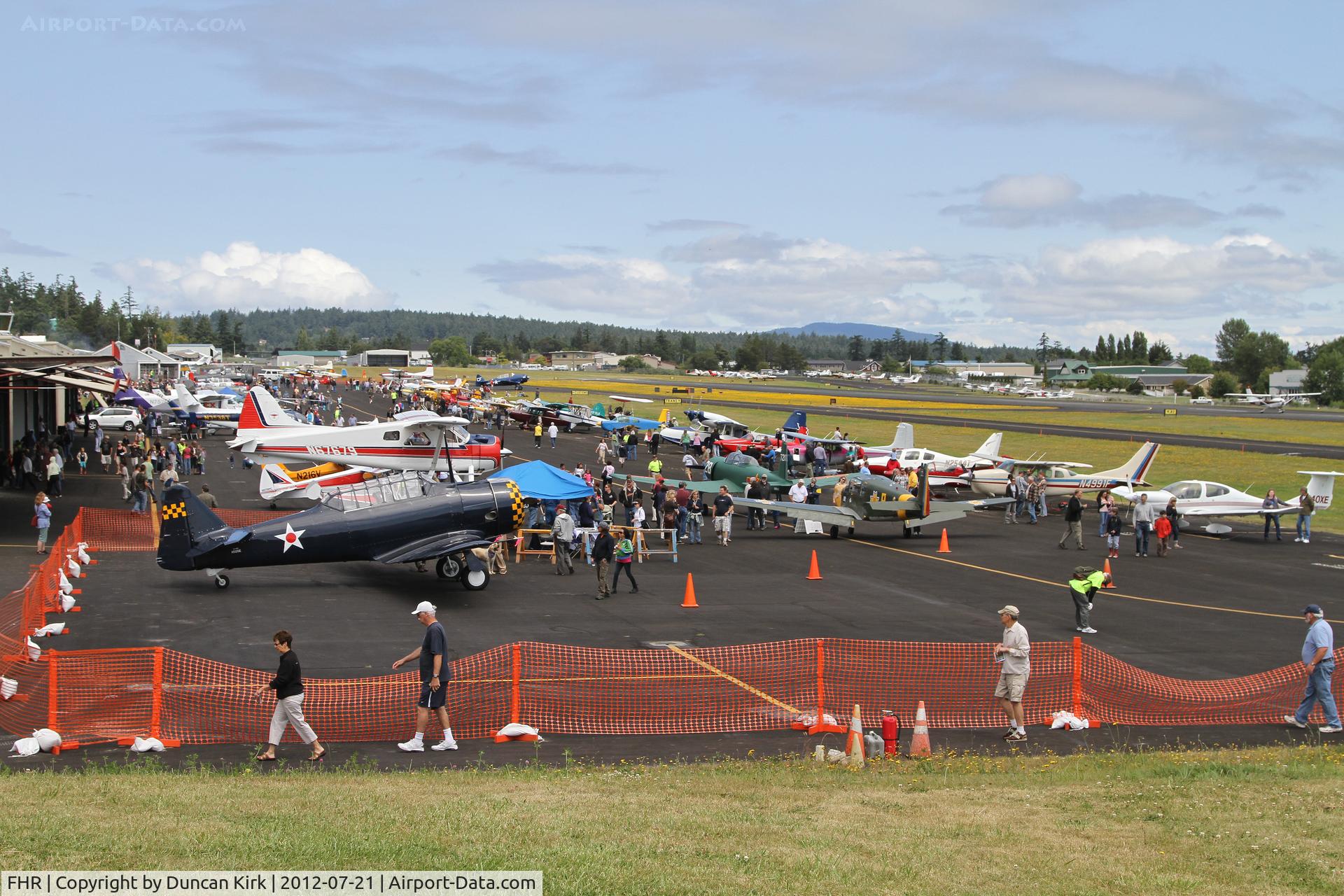 Friday Harbor Airport (FHR) - Photo of the ramp for the 2012 Friday Harbor Fly-in. Low cloud in the morning reduced the numbers of visitors