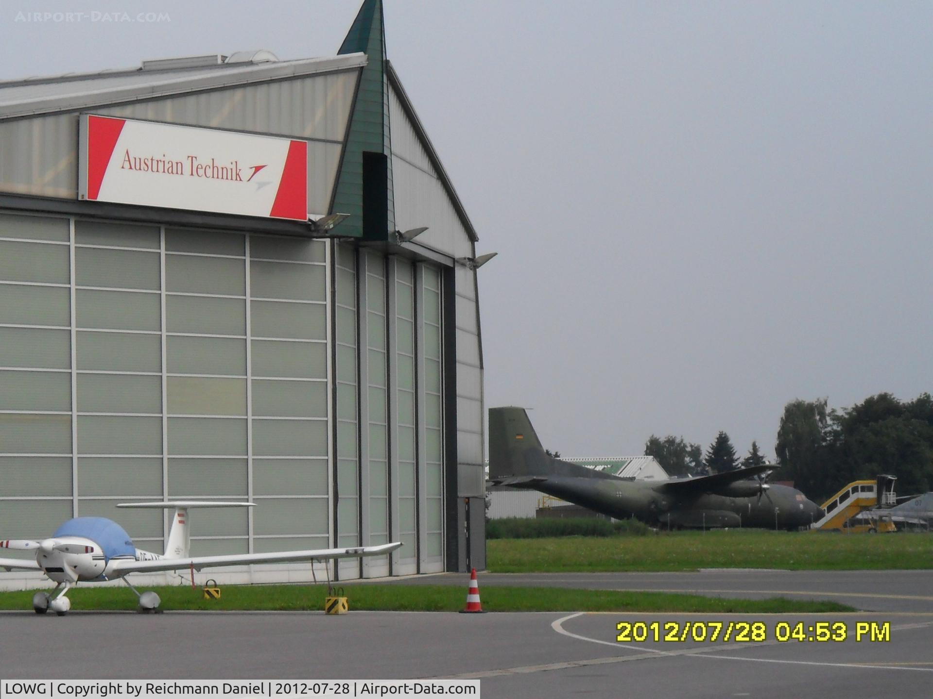 Graz Airport, Graz Austria (LOWG) - The Austrian Technik with the transall c-160 in the background :)