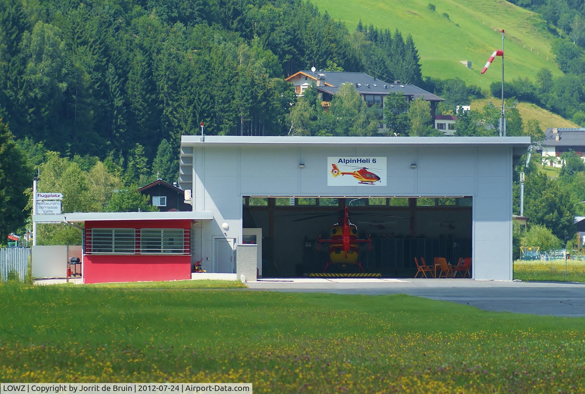 LOWZ Airport - The homebase of the AlpinHeli 6. It is ready to be pulled out of the hangar where the pilots are waiting in the lounge to fly. 