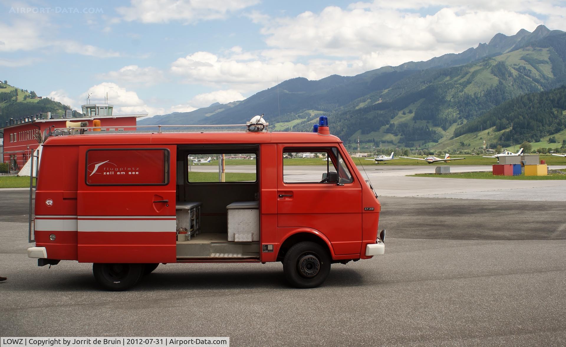 LOWZ Airport - The small fire truck of Zell am See airport, now parked at the Heli apron.